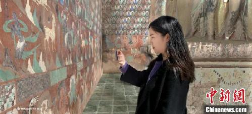 敦煌莫高窟推窟外展示游覽：游客可身臨其境享奇幻體驗(yàn)